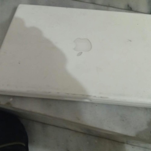Apple MacBook white laptop