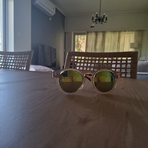 Komono sunglasses like new with mirrored green-gold lenses