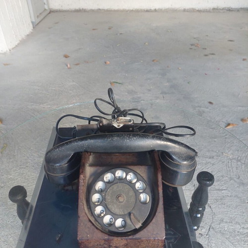 Antique telephone used, black corded