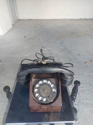Antique telephone used, black corded