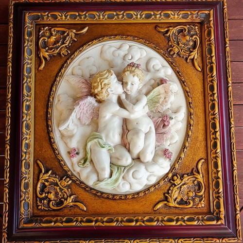 Relief wall art used in ornate frame 56x50cm