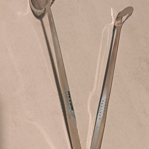 Handheld strainer tong like new, unused