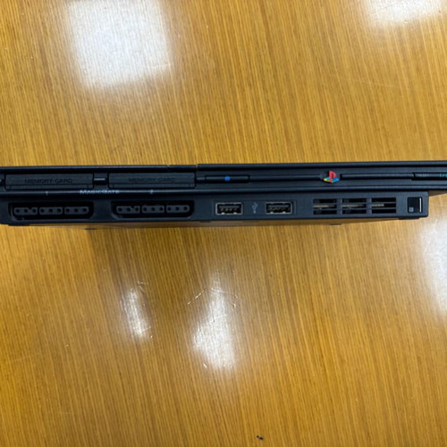 Sony PS 2 portable console used with cables and remote