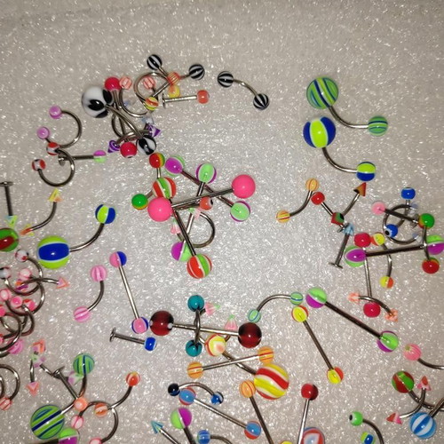 Piercing earrings set like new, 100 pieces, various designs and colors