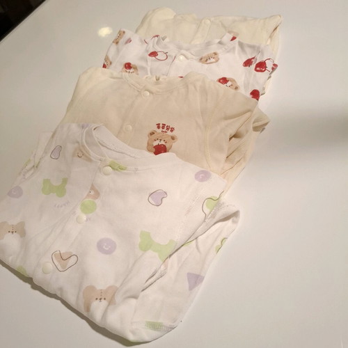 Labi Baby set of 4 full-body baby rompers like new 3-6 months