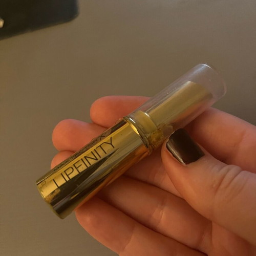 Max Factor red lipstick used