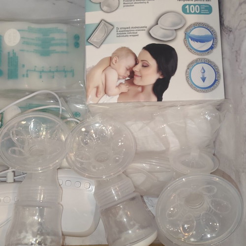 Breastfeeding set with pumps and accessories like new