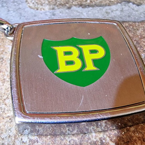 BP vintage keychain tape measure used
