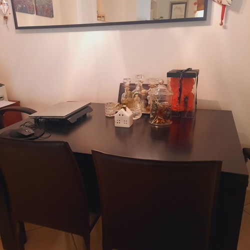Bo Concept extendable dining table with 4 leather chairs used