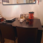 Bo Concept extendable dining table with 4 leather chairs used