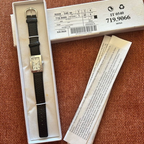 Women's wristwatch new with black leather strap