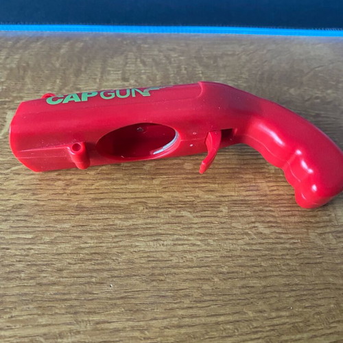 CapGun Toy like new, bottle opener that shoots the cap