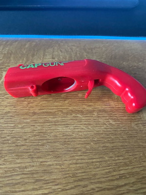 CapGun Toy like new, bottle opener that shoots the cap