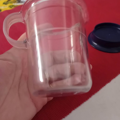 Vintage Tupperware jug with lid and handle like new