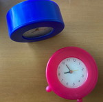 Plastic analog tabletop clocks like new