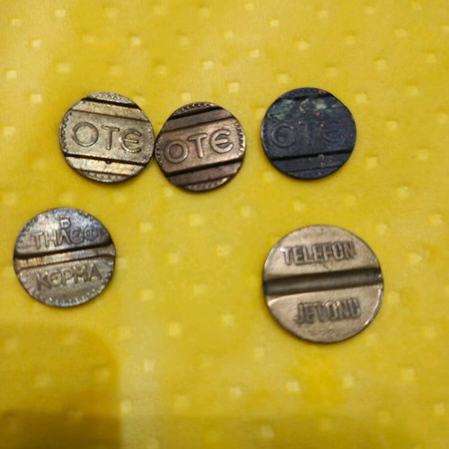Ote phone coins used, old telephone tokens