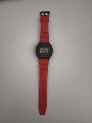 Casio digital watch 43.2mm chronograph battery with red rubber strap like new