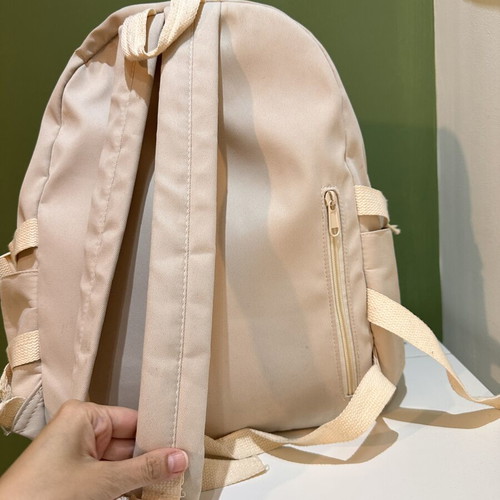 Beige travel bag backpack, used