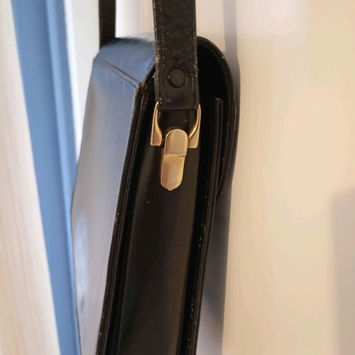 Black leather shoulder bag used with minimal wear