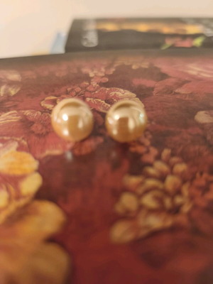 Button earrings in bright honey glossy color like new