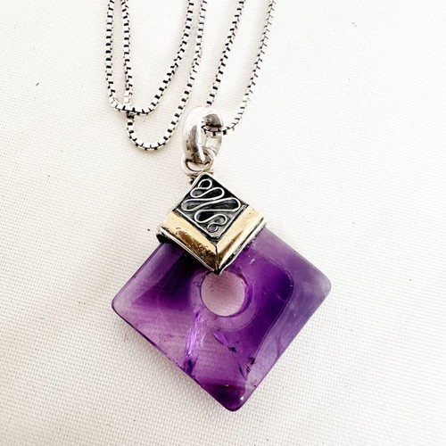 Vintage pendant with amethyst in 925 silver and gold