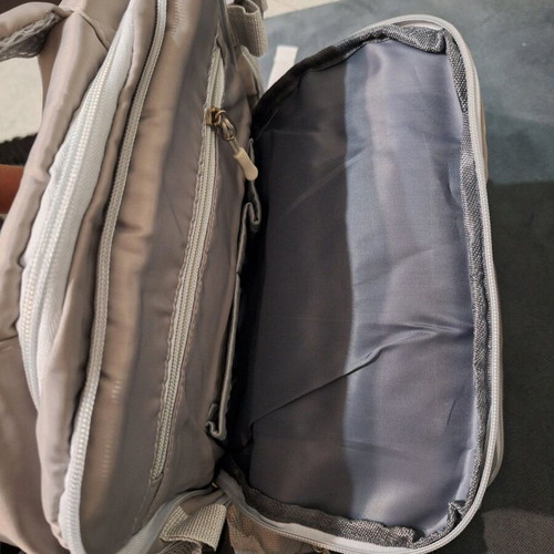 Backpack new, gray with multiple compartments and USB port