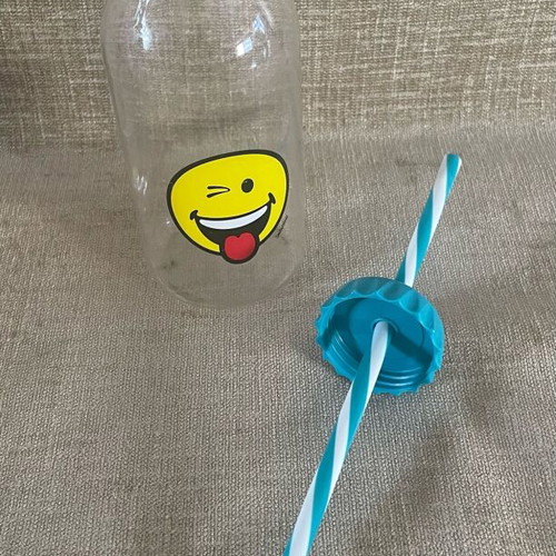 Plastic Transparent Bottle with Straw and Emoji Face Used