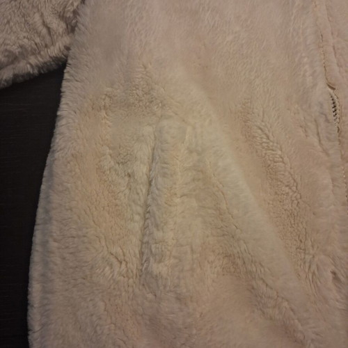 Reversible fur jacket with hood and pockets