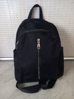 Black satin backpack used