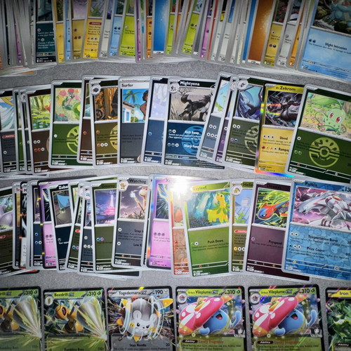 Pokemon bulk cards set with 125 non-foil and 58 foil cards