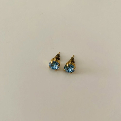 Earrings used, yellow color with blue stone