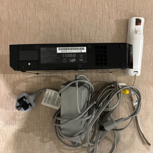 Nintendo Wii console black used with cables and controller