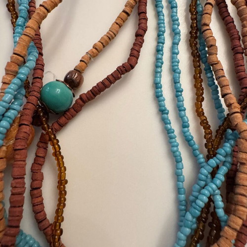 Women's long necklace from beads and wood like new, turquoise and brown