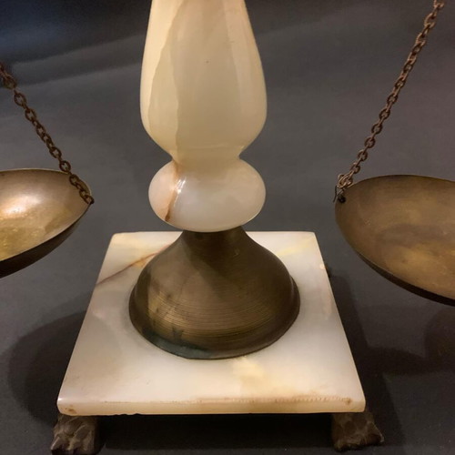 Decorative antique scale used with marble base and brass details