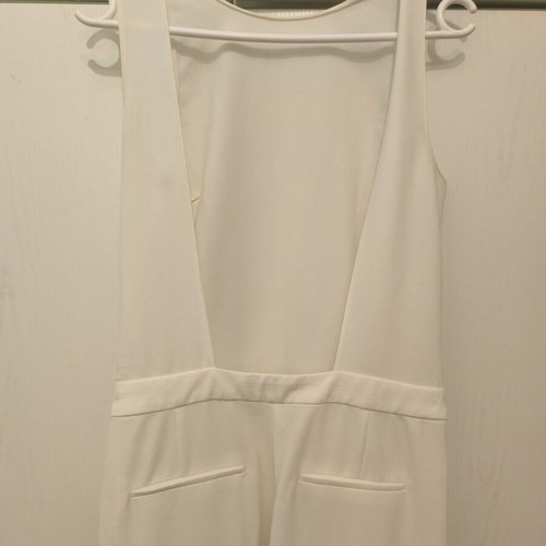 Zara white jumpsuit with open back, slim fit, pockets