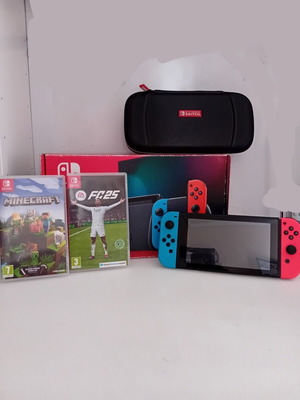 Nintendo Switch Blue & Red Joy-Con like new with 2 games and 128GB card