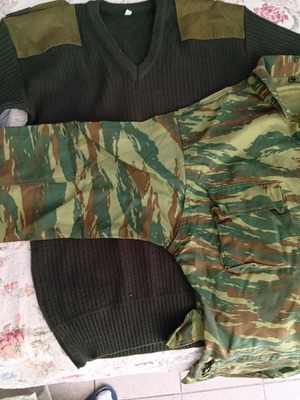 Camouflage jacket size 15 and military-style sweater size 4