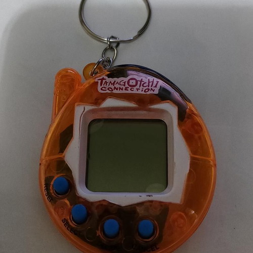 Tamagotchi Connection Orange Transparent like new