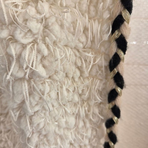 Sleeveless coat like new, lambswool style with gold and black details