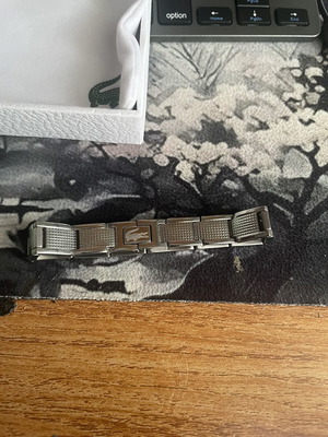 Lacoste bracelet new, silver color