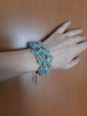 Bracelet with crystals and linen used