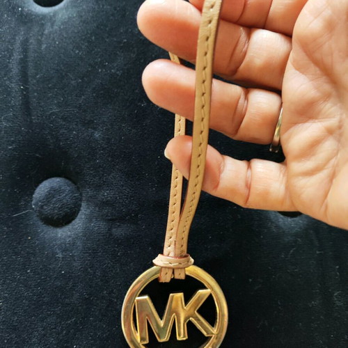 Michael Kors Leather Logo Charm like new, beige and gold bag keychain
