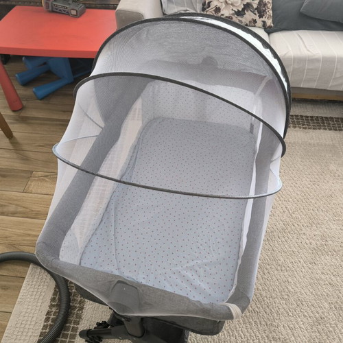 Baby Cot like new with mattress, wheels, shelf, and mosquito net