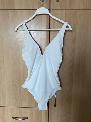 One-piece white swimsuit size 42 like new with adjustable straps