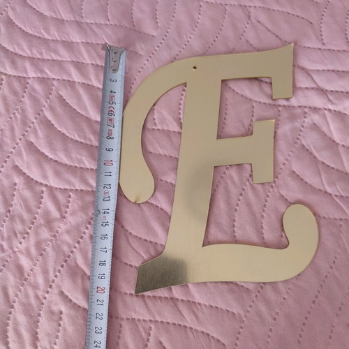 Gold Plexiglass Letter E Candy Bar like new