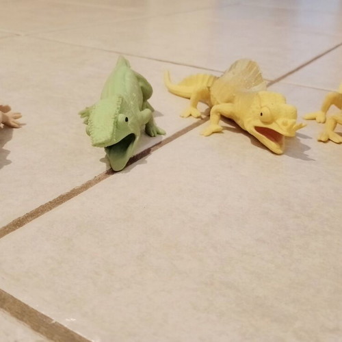 Rubber toys set of 4 used, chameleons and reptiles