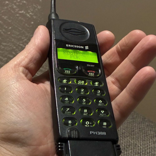 Ericsson 388 used, black, works with charger only