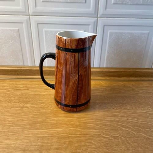 Vintage ceramic pitcher like new with wooden barrel design