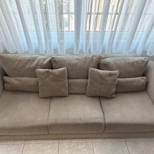 Three-seater fabric sofa in beige-grey