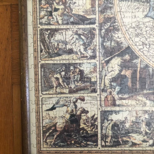 World puzzle with frame used, brown color and glass
